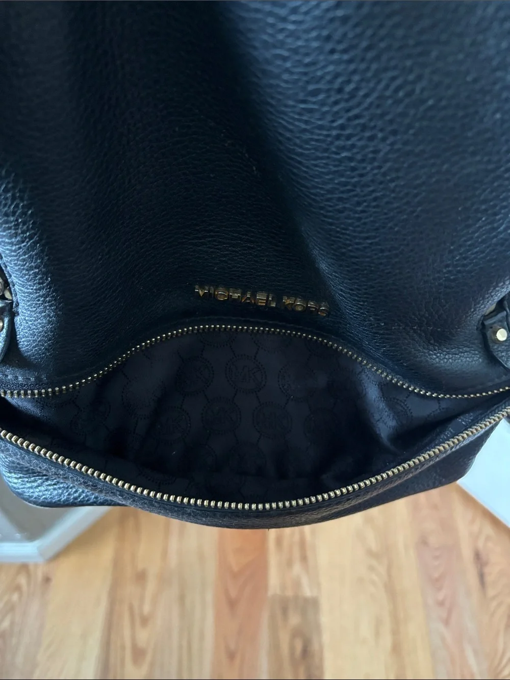 Michael Kors Black Pebbled Leather Backpack with Gold Accents